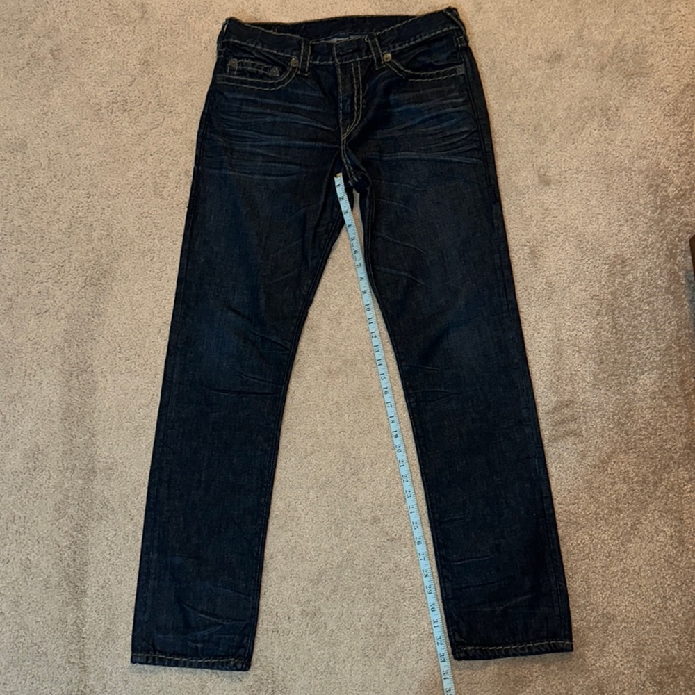 Men’s True Religion jeans.